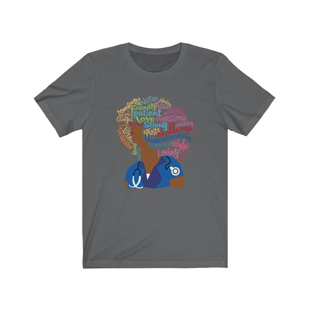 asphalt grey bella canvas shirt displaying a black or latina woman with an afro. Words make up the afro to include patient, loving, caring, dedicated, spirts, friendly