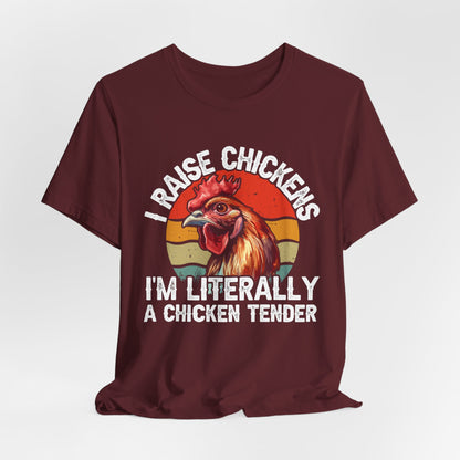 maroon shirt with I raise chickens I'm Literally a chicken tender on the front in distressed print. There is a rooster in the design. 